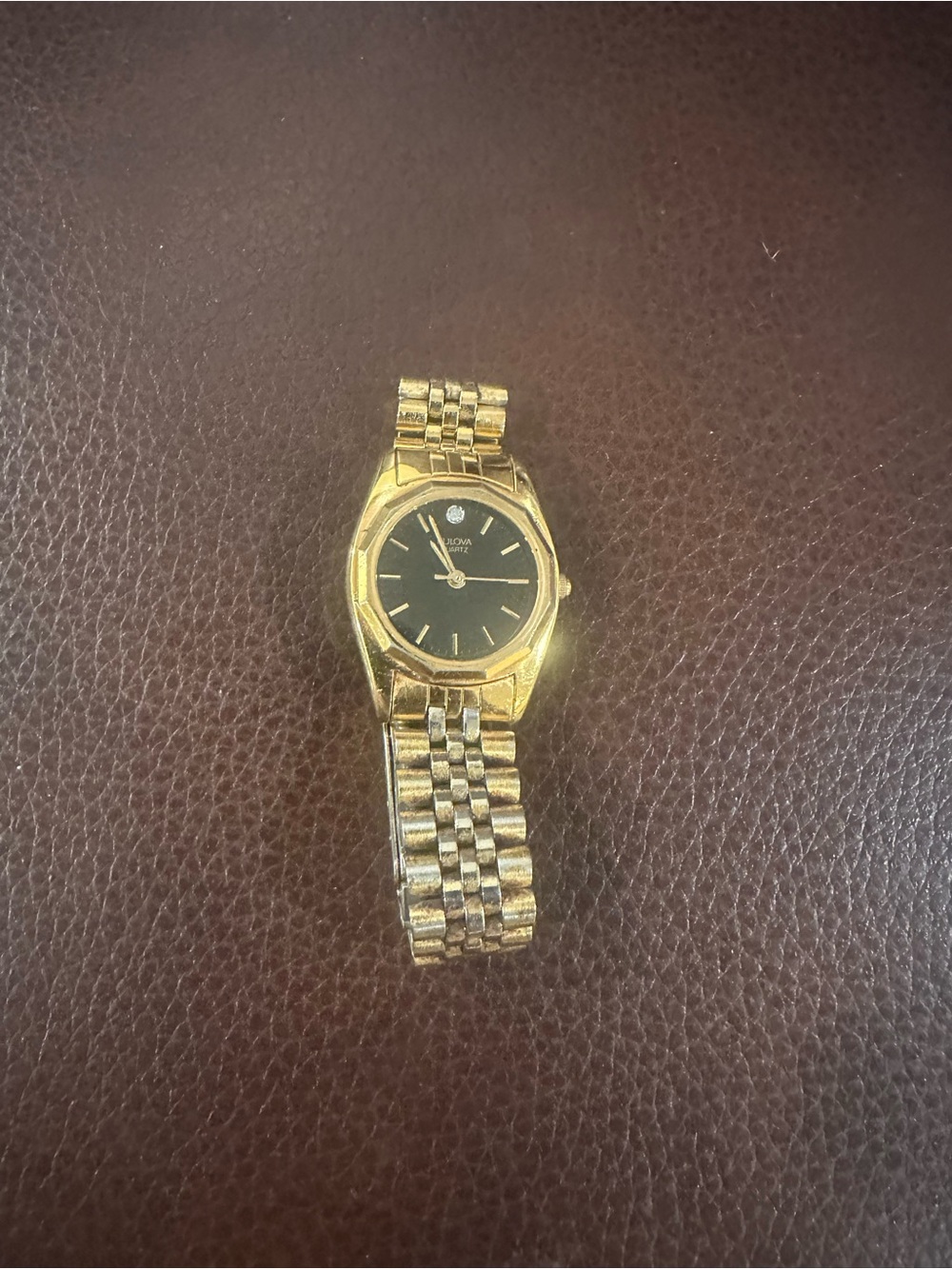 Bulova Gold and Black Classic Bracelet Watch. 23 mm face.
